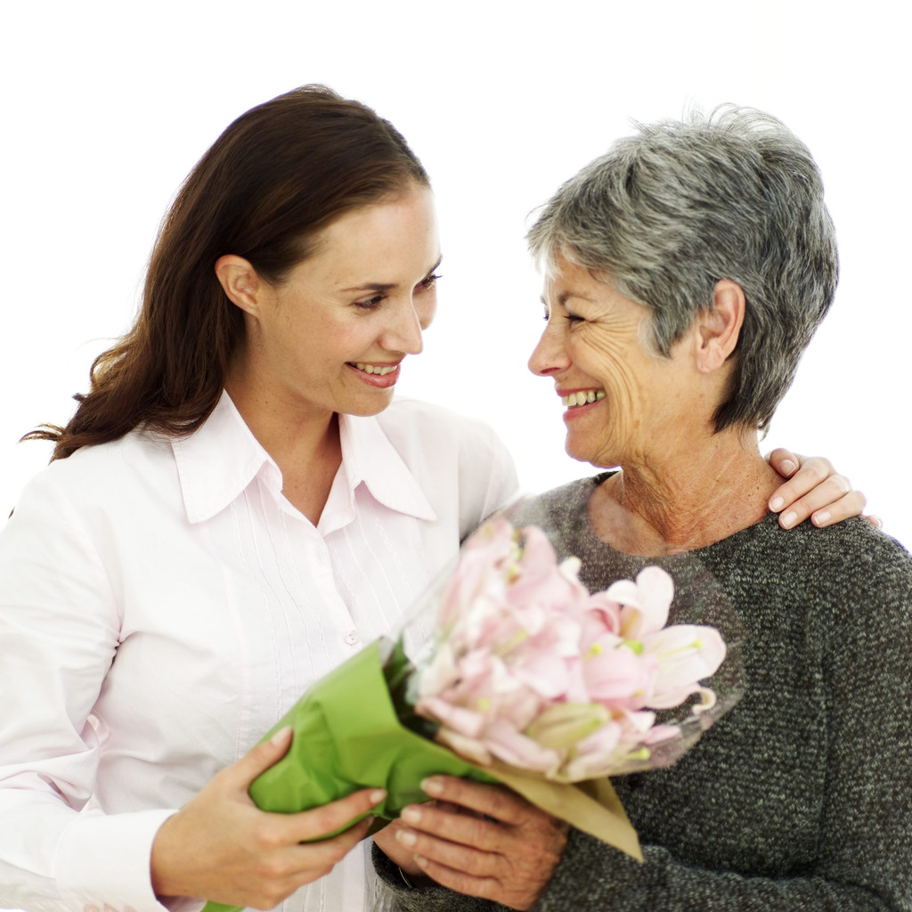 Mother and Daughter Holding a Bouquet of Flowers --- Image by © Royalty-Free/Corbis Mother and Daughter Holding a Bouquet of Flowers --- Image by © Royalty-Free/Corbis